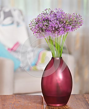 Giant Onion (Allium Giganteum) flowers in the flower vase on tab photo