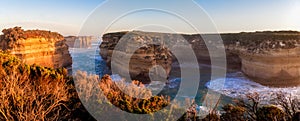 Giant Panorama. Orange sunset at blue ocean. Twelve Apostles Sea Rocks near Great Ocean Road, Port Campbell National Park,