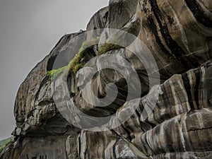 Giant rock formations in a nature reserve with humid weather photo