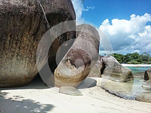 Giant rocks in Tanjung Tinggi Beach, Belitung Island, Rainbow Troops film setting location, Indonesia photo