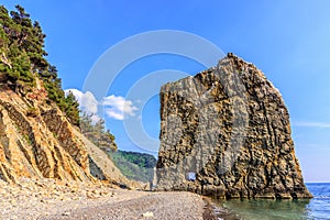 Giant sail-like rock named Parus on Black Sea coast of Caucasus Mountains, Gelendzhik, Russia. Scenic landscape at sunset