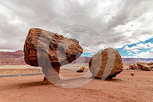 Giant series of boulders under th beautiful clouds and sky, Vermillion cliff range, Page, AZ, USA
