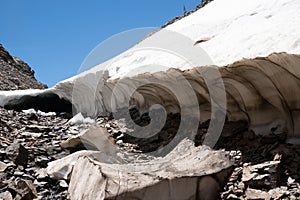 Giant snow cave along the 20 Lakes Basin trail in Eastern Sierra Nevada California