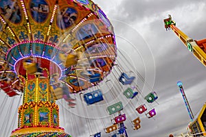 A giant spinning ride in the amusement park.