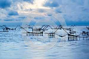 Giant square dipnets on cloudy sky background