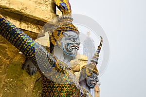 Giant Statue Surround The Basement of Grand Gold Stupa Is One of Landmark of Wat Phra Kaew Monastery, Bangkok of Thailand.