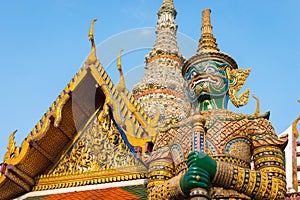 Giant statue at Temple of the Emerald Buddha (Wat pra kaew) , Grand palace ,Bangkok,Thailand photo