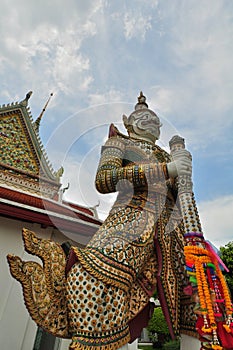 Giant statue at Wat Arun, Bangkok Thailand