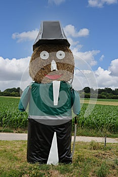 Giant straw doll  dressed as the officer of the guard