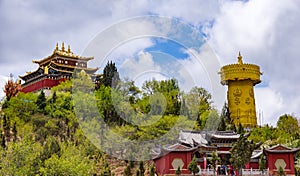 Giant tibetan prayer wheel and Zhongdian temple - Yunnan privince, China