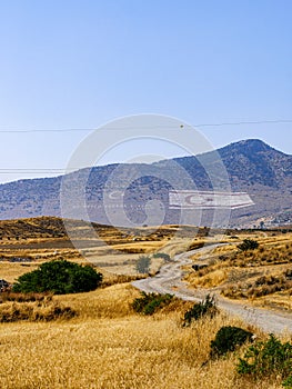 Giant Turkish Republic of Northern Cyprus and nationalist slogan painted on the flank of the Kyrenia aka Girne mountains