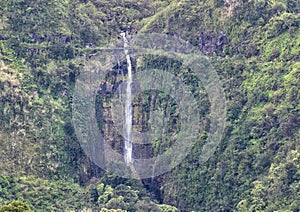 Giant waterfall on the Hana side of the Island of Maui in the State of Hawaii.