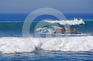 Giant wave crashing on the Rock Pile at Laguna Beach, California
