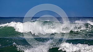 Giant waves break just off the North Shore