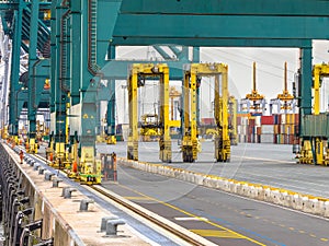 Giant wharf cranes in container terminal