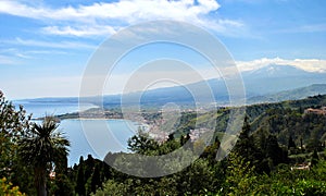 Giardini-Naxos bay with the Etna volcano