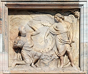 Gideon being called by God to deliver Israel from the Midianites, marble relief on the facade of the Milan Cathedral