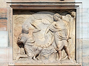 Gideon being called by God to deliver Israel from the Midianites, marble relief on the facade of the Milan Cathedral