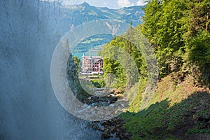 giessbach waterfall with view to hotel and lake Brienzersee, Bernese Alps photo