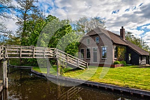 Giethoorn Netherlands, canal and traditional house in Giethoorn village