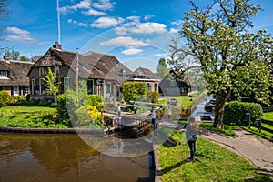 Giethoorn Netherlands, panorama at canal and traditional house in village