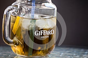 Giffard France logo on a mason jar containing one of their beverages. Giffard is a French brand of syrups and flavored liquors