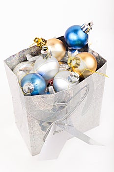 Gift bag filled with Christmas decorations