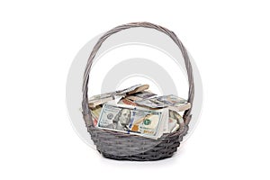 Gift basket full of money in different currencies