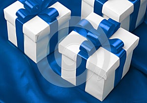 Gift on blue satin background