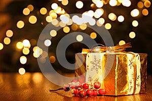 Gift Box Against Christmas Lights Background