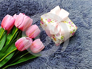 Gift box with artificial tulip flowers bouquet
