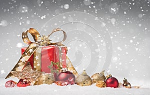 Gift Box and Baubles on Snow with falling Snowflakes - Christmas Background - Voucher