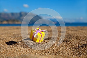 Gift box on a beach