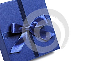 Gift box with blue holiday bow