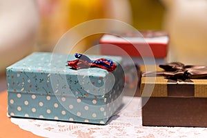Gift box with blue texture and Red bow