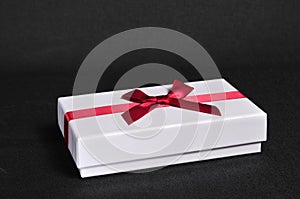 Gift box with bow for gifts on Christmas, birthday or Valentines
