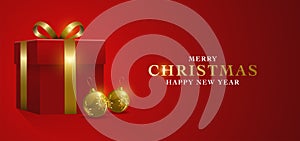 Gift box with Christmas decoration on red background