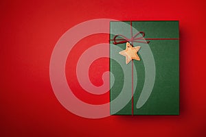 Gift box or Christmas gift box on a red background