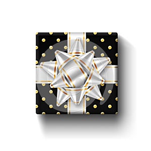 Gift box 3d top view, isolated white background. Silver ribbon on black square giftbox. Present design bow for Christmas