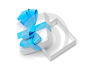 Gift box decorated with ribbon. Open empty container with blue bow