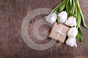 Gift box with flowers white tulips