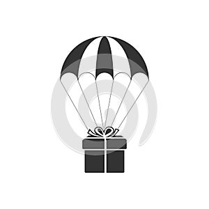 Gift box flying on parachute icon isolated. Delivery service, air shipping concept, bonus concept