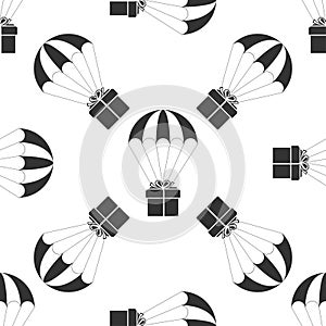 Gift box flying on parachute icon seamless pattern on white background. Delivery service, air shipping concept, bonus