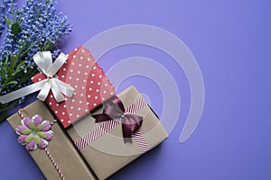 Gift box and gift shopping on purple background view from above