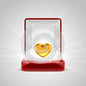 Gift box and gold heart in radiance