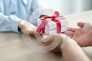 Gift box hand holding a gift box Glad to be the giver of surprise with excitement, the joy on the holidays, Christmas, birthdays,