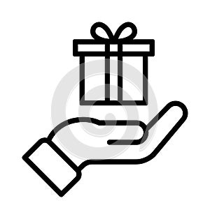 Gift box in hand icon