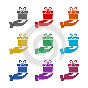 Gift box in hand icon isolated on white background. Set icons colorful