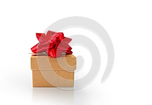 Gift box isolated on white background. Cardboard present box decorated with bow