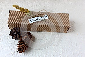 Gift box with a love note and cones